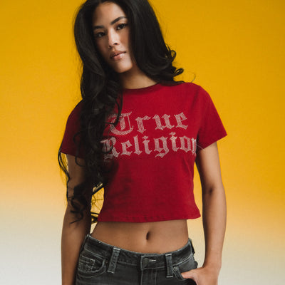 Woman wears True Religion Crystal True Religion Baby Tee “Red Dahlia” tee. Shop Women’s Clothing now at JD Sports.