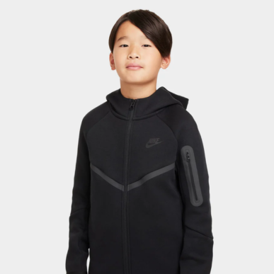 Kid wears Nike Sportswear Junior Boys' Tech Fleece Hoodie "Black". Shop Kids' Clothing now
