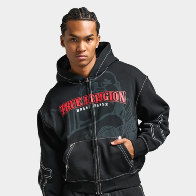 Man wears True Religion Cinched Big T Zip Up Hoodie "Jet Black". Shop Men's Clothing now