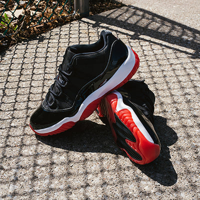 Jordan 11 Retro Low "Black / Varsity Red - White" on sale right now. Shop Men's shoe sale now at JD Sports.