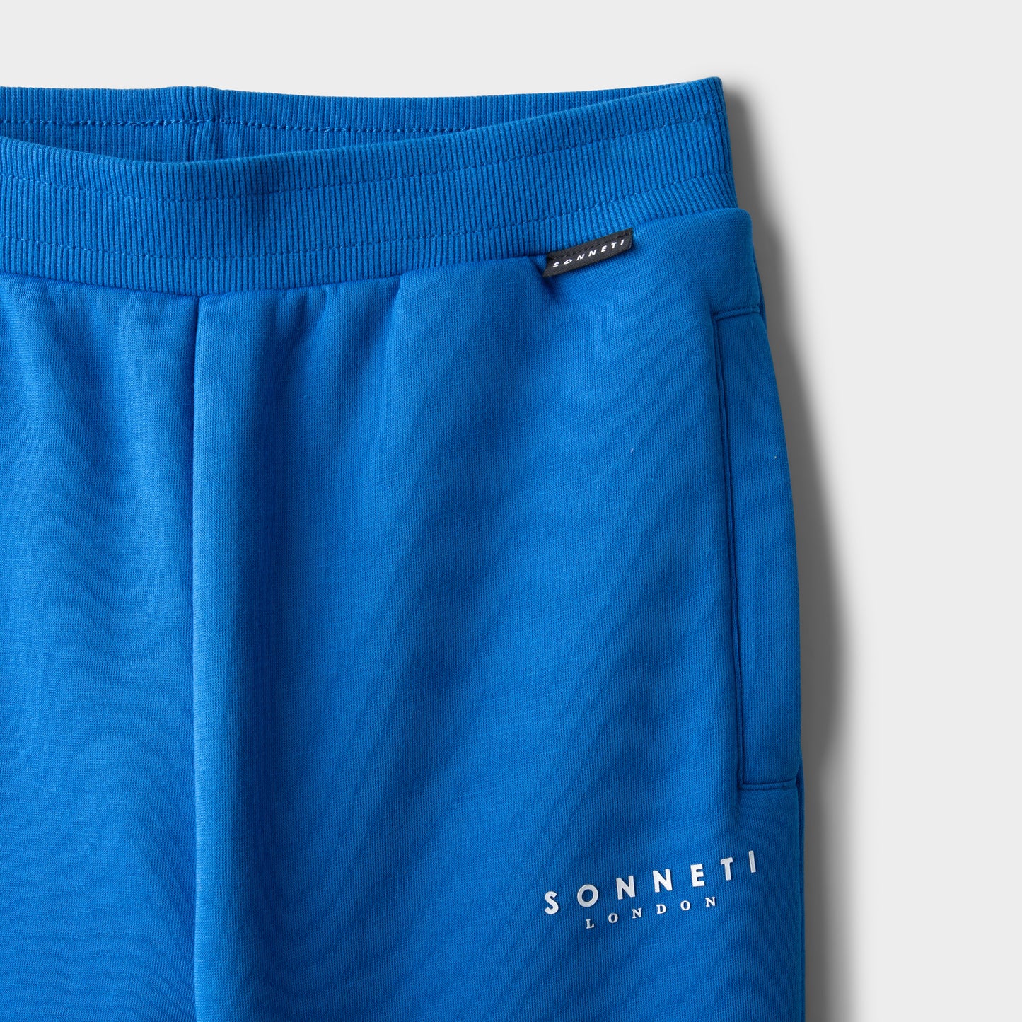 Sonneti Junior Pantalon Jogger en polaire London pour garçon / Bleu princesse