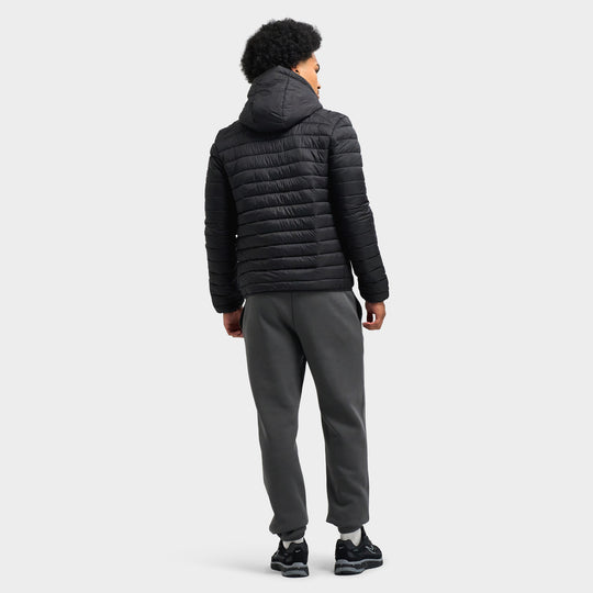 Sonneti Cargo Jacket. Full-length rear view displaying black narrow-quilted hooded jacket styled with dark grey fitted joggers. 