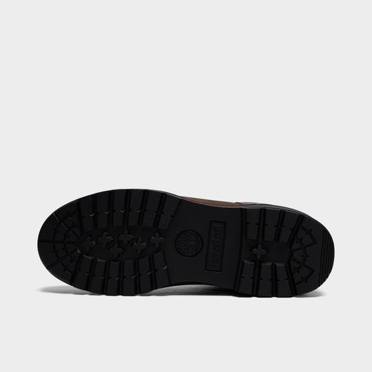 Timberland Field Boot. Bottom view of single shoe displaying full black rubber outsole with heavy lugged traction pattern and center Timberland tree logo. 