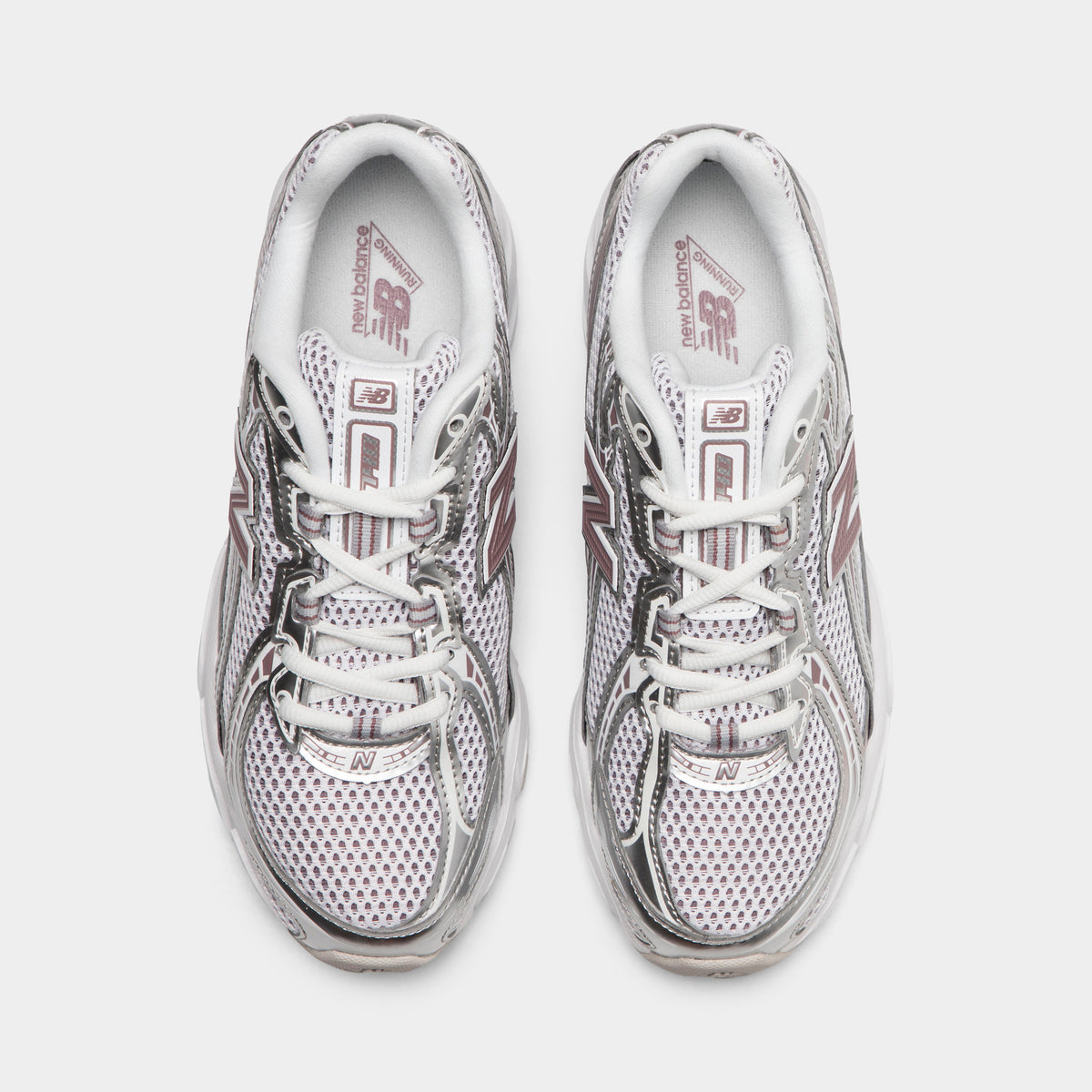 New Balance 740. Top view of silver metallic, raincloud and pebble sneakers showing grey laces, padded tongues and mesh toe boxes.