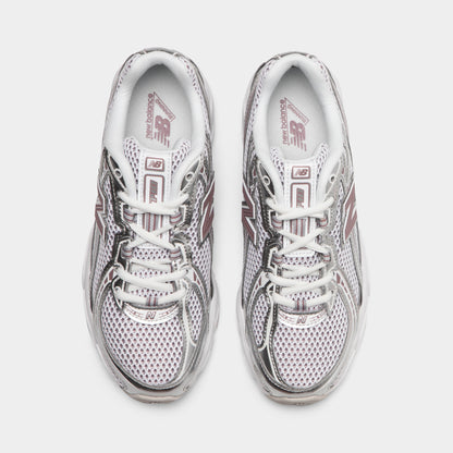 New Balance 740. Top view of silver metallic, raincloud and pebble sneakers showing grey laces, padded tongues and mesh toe boxes.