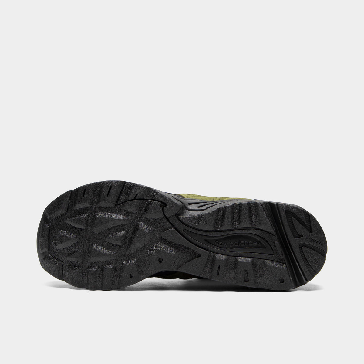 New Balance 880. Bottom view of single shoe displaying full black rubber outsole with multidirectional tread pattern. 