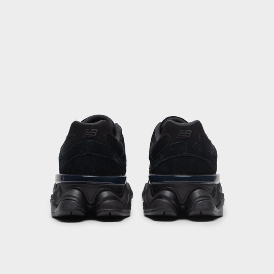 New Balance 9060. Rear view of black and phantom sneakers with padded heel panels and sculpted midsoles.