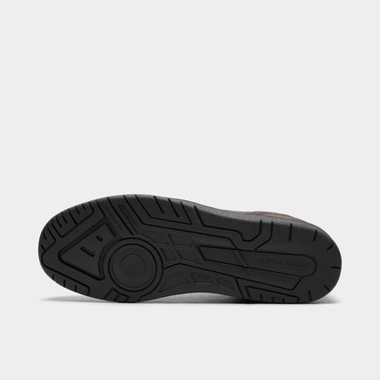 New Balance 950. Bottom view of single shoe displaying full black rubber outsole with multidirectional tread pattern and center New Balance logo. 