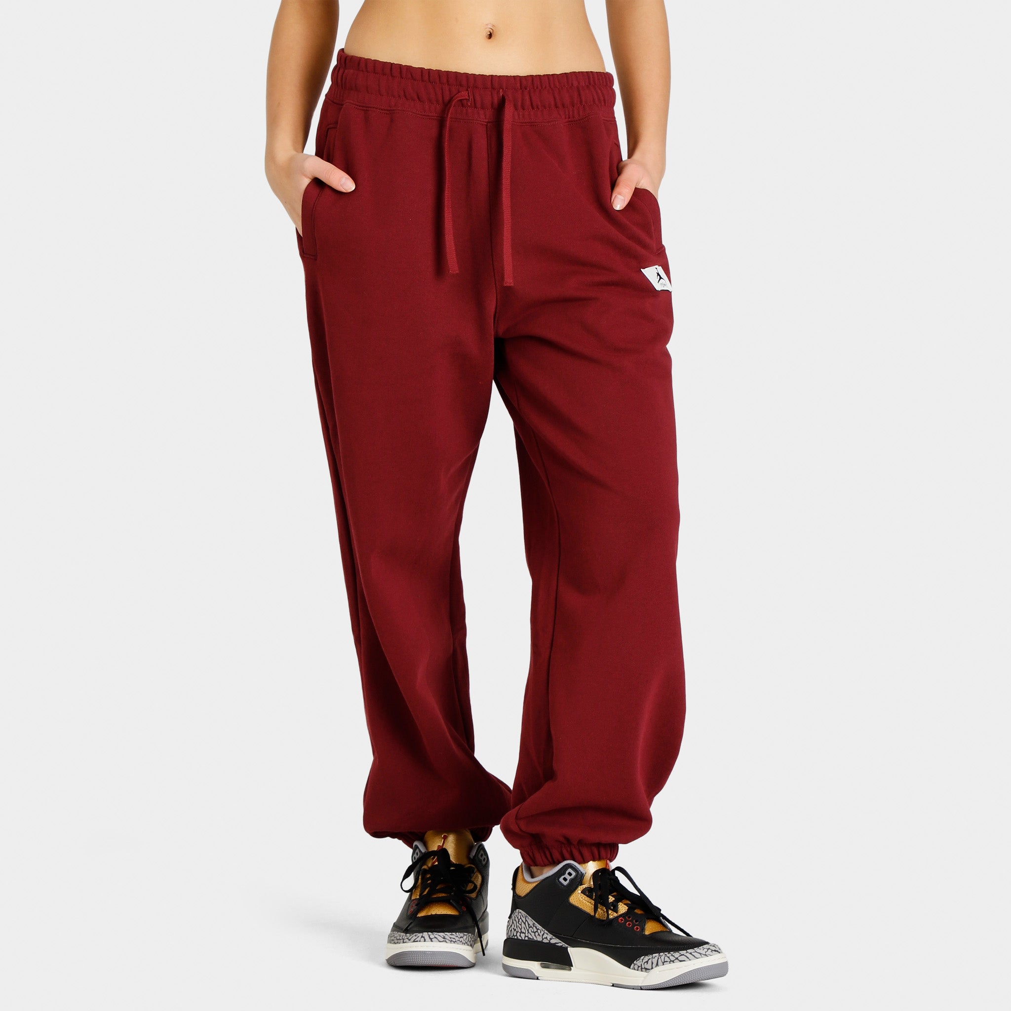 Jordan Women's Flight Fleece Pants / Cherrywood Red | JD Sports Canada