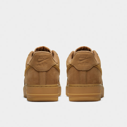 Nike Air Force 1 '07 WB. Rear view of the pair showing the wheat-brown heel panels and gum soles.
