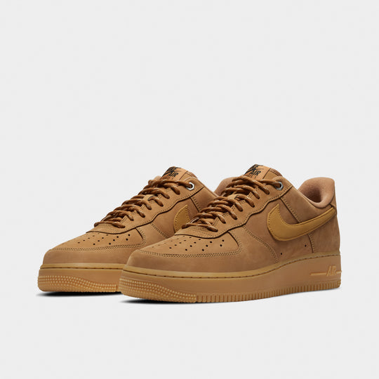 Nike Air Force 1 '07 WB. Angled view of the pair in wheat-brown suede with tonal detailing and gum soles.
